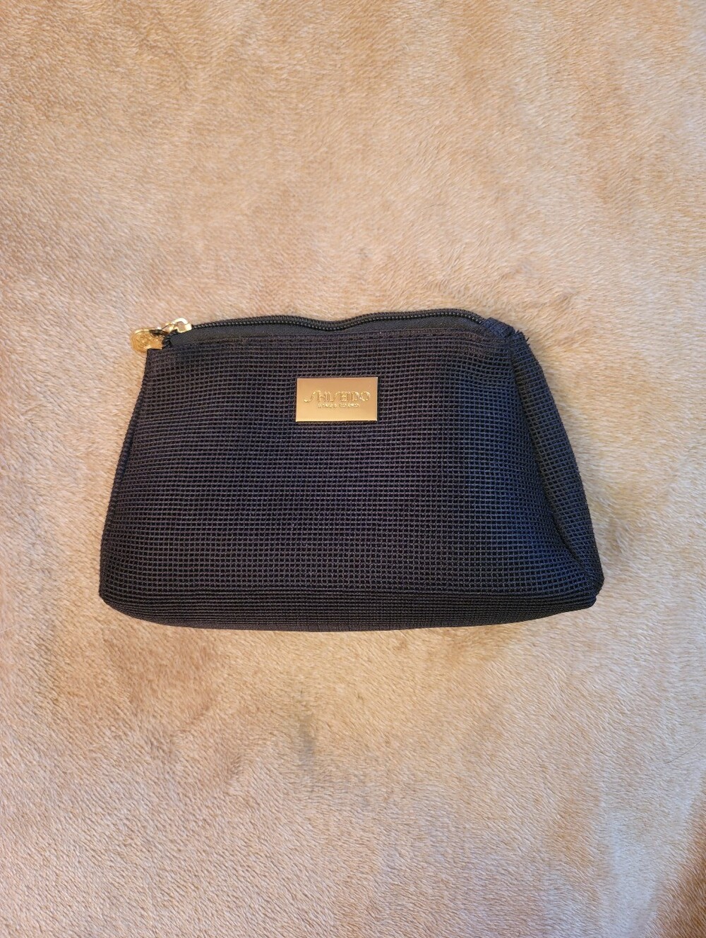 Shiseido || black makeup bag